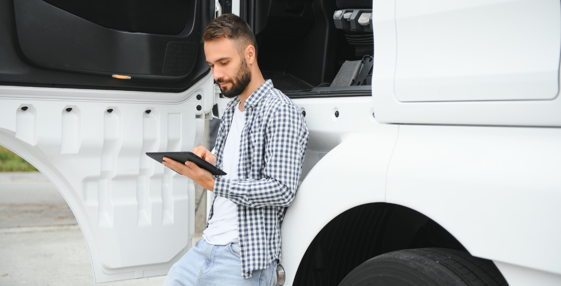 a man checking all the details of the truck