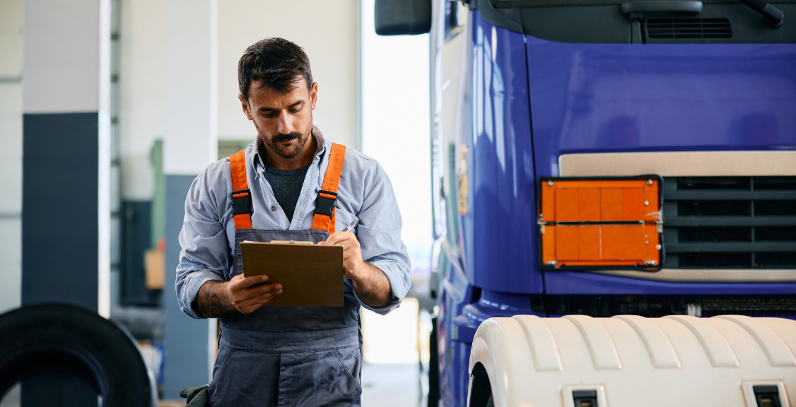 a man taking notes and checklist for eld compliance