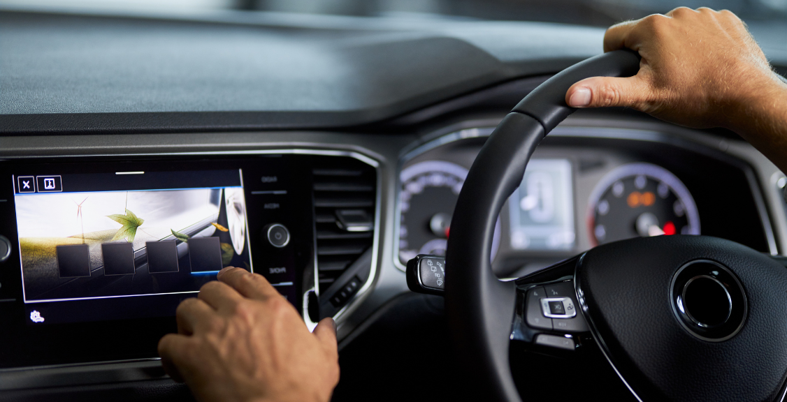 a man using video telematic while driving