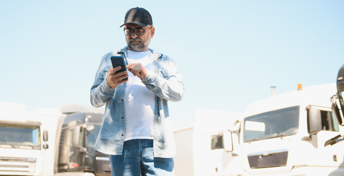 a driver checking an eld app for trucks